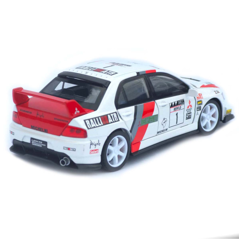 Машинка метал Mitsubishi Lancer Evolution IX біла 1:32 світло звук відч двері капот багаж (TK-13970)