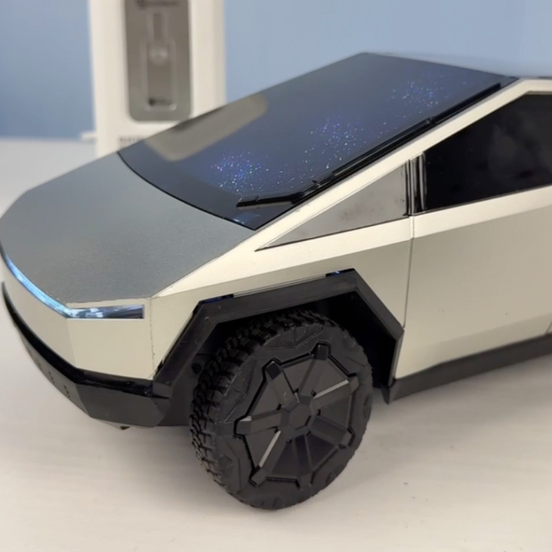 Машинка Tesla Cybertruck Тесла пульт сіра акум звук світло заряд.станція пластик 31,5х12х10,5см (PM3420)