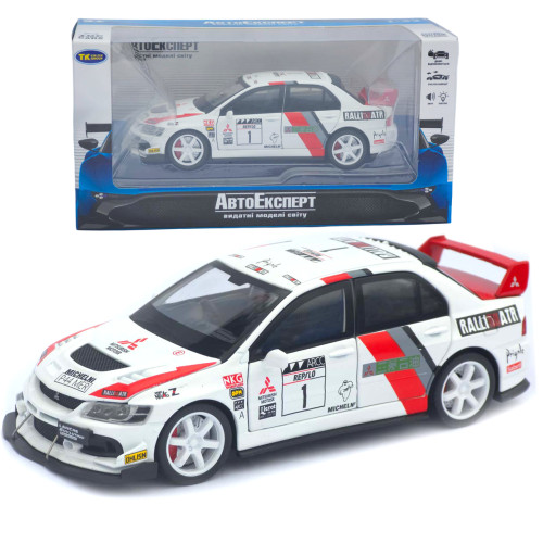 Машинка металл Mitsubishi Lancer Evolution IX белая 1:32 свет звук открыв двери капот багажник (TK-13970)