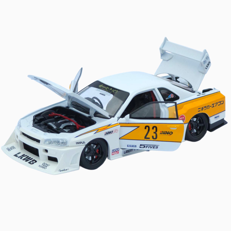 Машинка метал Nissan Skyline GT-R (R34) АвтоЕксперт біла 1:24 звук світло відч двері капот багажник (2916-39)