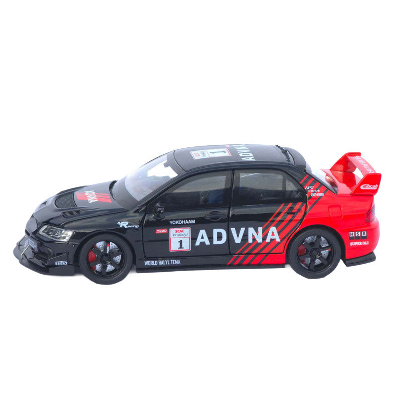 Машинка метал Mitsubishi Lancer Evolution IX чорна 1:32 світло звук відч двері капот багаж (TK-76054)