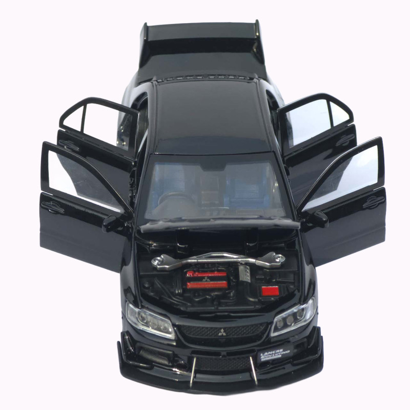 Машинка метал Mitsubishi Lancer Evolution IX чорна 1:32 світло звук інерція відч двері баг капот 15*5,5*4,5см (TK-20651)