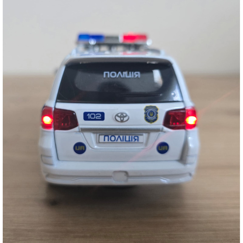 Машина металева поліція Авто Експерт Toyota Land Cruiser 200 1:32 світло звук інерція відч двері баг капот 15*6*6см (41153)