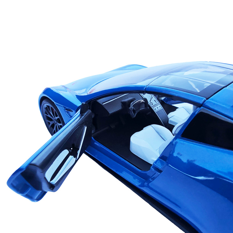Машинка матал Tesla Roadster Тесла синя електро зарядка 1:24 звук світло 17*6,5*4,5см (RS-03612)