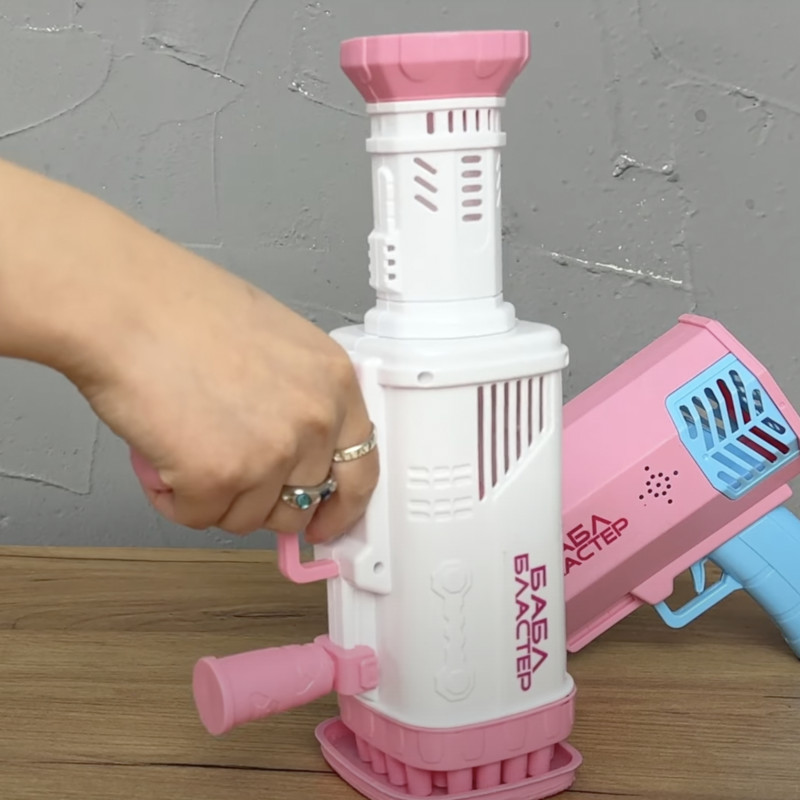 Пістолет з мильними бульбашками Бабл бластер WToys рожевий акум 3,7 V кольорове підсвічування 32 отвори мильний розчин 27*8*20см (49076)