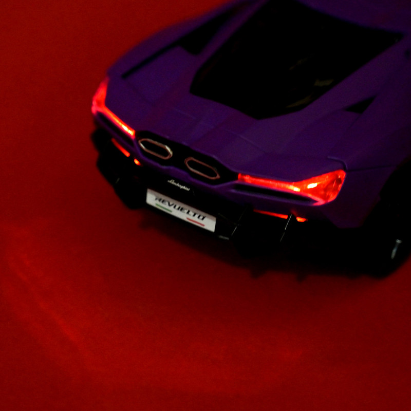 Машинка металлическая Lamborghini Revuelto Автопром фиолетовая 1:24 свет звук откр двери 20*8*5 см (68200A(P))