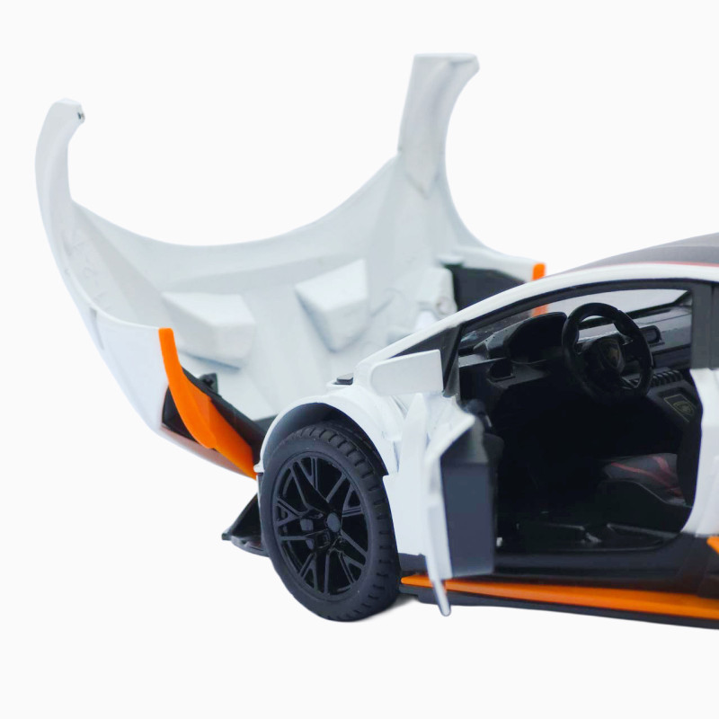 Машинка метал Lamborghini Huracan STO біла 1:24 звук світло відчин двері капот багажник (2511-98)