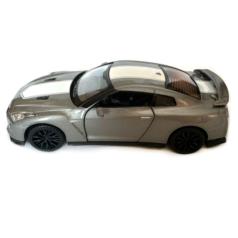 Машина металева Nissan GT-R Anniversary Edition ніссан Автопром синя 1:32  світло звук відкр двері 14*5,5*4см (68469)