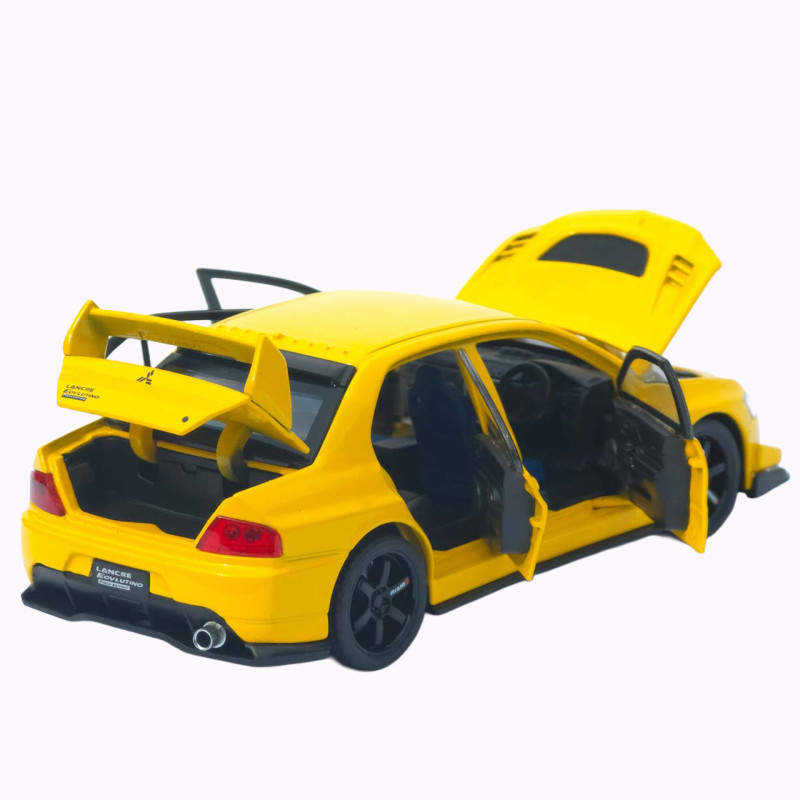 Машинка металл Mitsubishi Lancer Evolution IX желтая 1:32 свет звук инерция откр двери баг капот 15*5,5*4,5см (TK-20651)