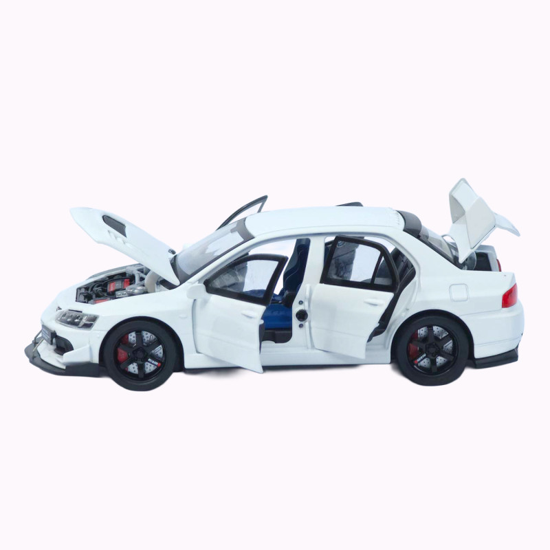 Mitsubishi Машинка метал Lancer Evolution IX біла 1:32 світло звук інерція відч двері баг капот 15*5,5*4,5см (TK-20651)