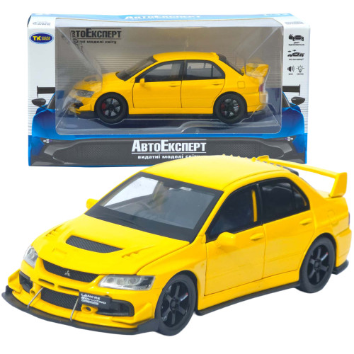Машинка метал Mitsubishi Lancer Evolution IX жовта 1:32 світло звук інерція відч двері баг капот 15*5,5*4,5см (TK-20651)