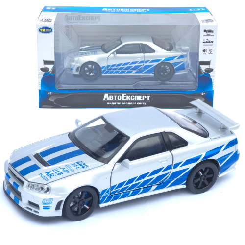 Машинка метал Nissan Skyline GT-R срібляста 1:32 світло звук інерція відч двері капот багаж (TK-13306)