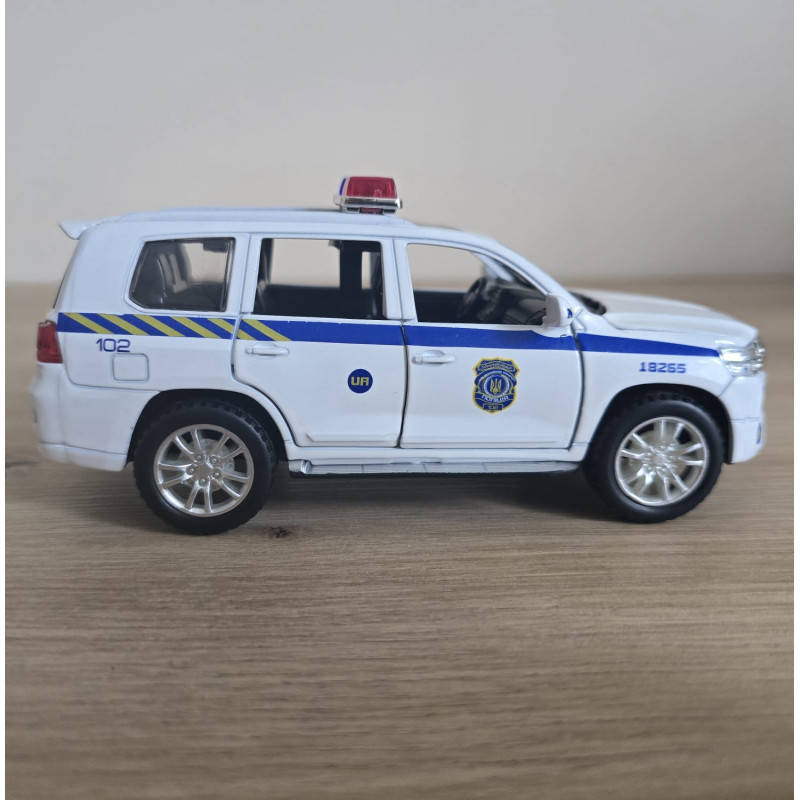 Машина металева поліція Авто Експерт Toyota Land Cruiser 200 1:32 світло звук інерція відч двері баг капот 15*6*6см (41153)