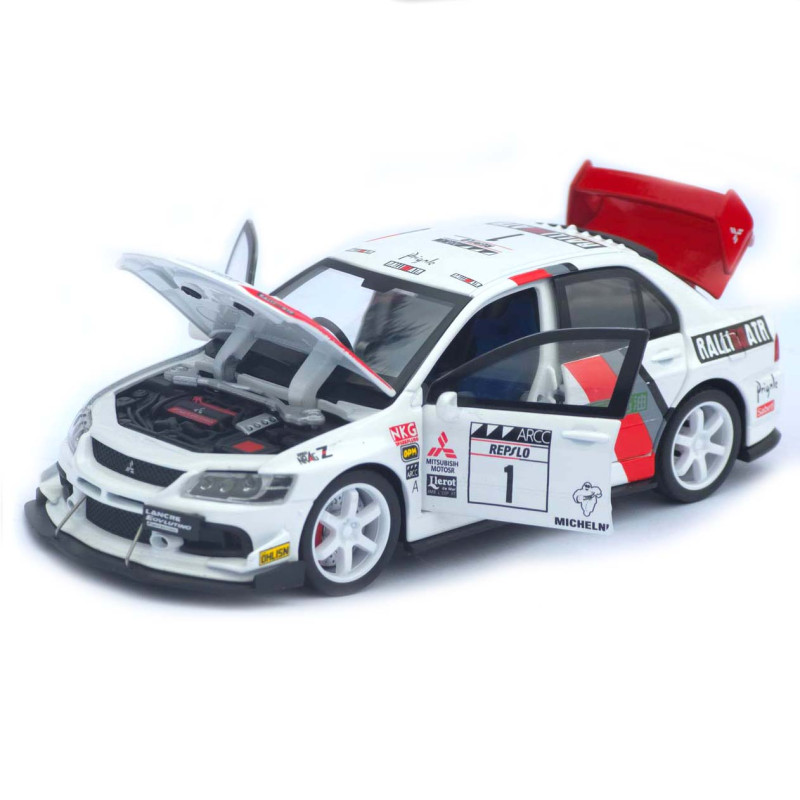 Машинка метал Mitsubishi Lancer Evolution IX біла 1:32 світло звук відч двері капот багаж (TK-13970)