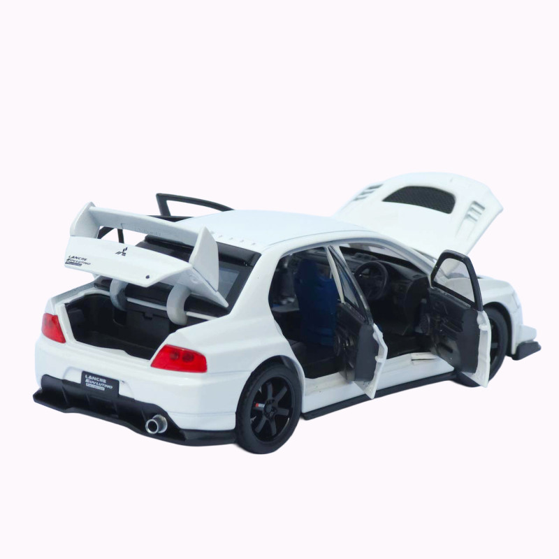 Mitsubishi Машинка метал Lancer Evolution IX біла 1:32 світло звук інерція відч двері баг капот 15*5,5*4,5см (TK-20651)