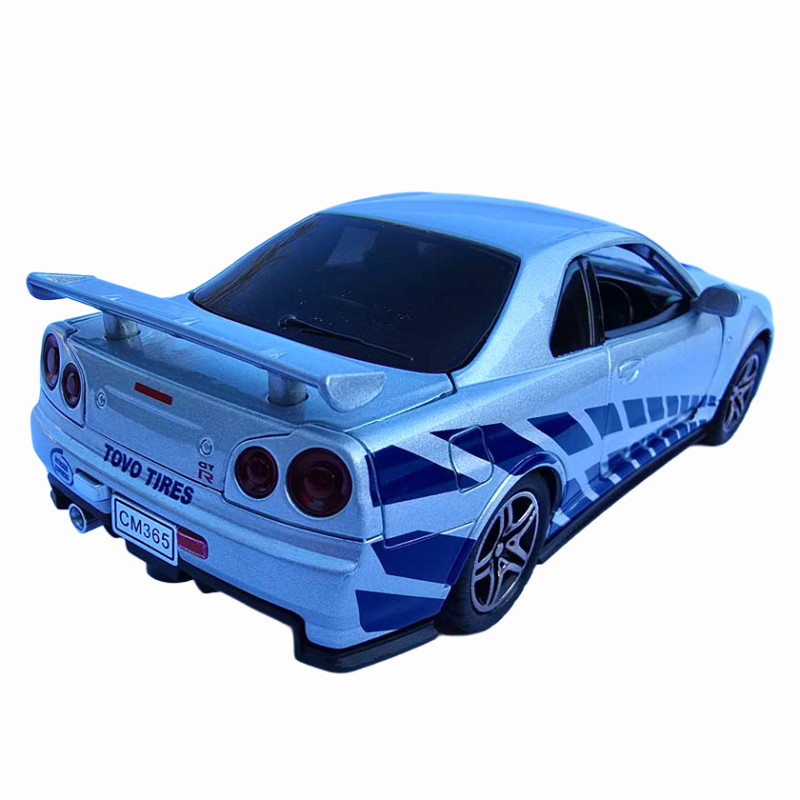 Машинка металева Nissan Skyline GT-R R34 Автоексперт срібляста 1:32 світло звук відкр двері (60822)