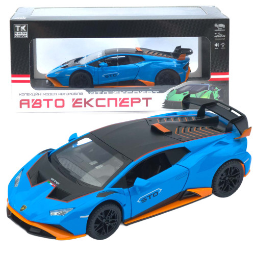 Машинка метал Lamborghini Huracan STO блакитна 1:24 звук світло відчин двері капот багажник (2511-98)