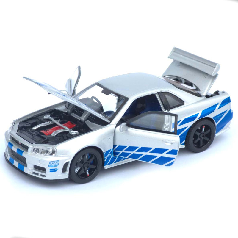 Машинка метал Nissan Skyline GT-R срібляста 1:32 світло звук інерція відч двері капот багаж (TK-13306)