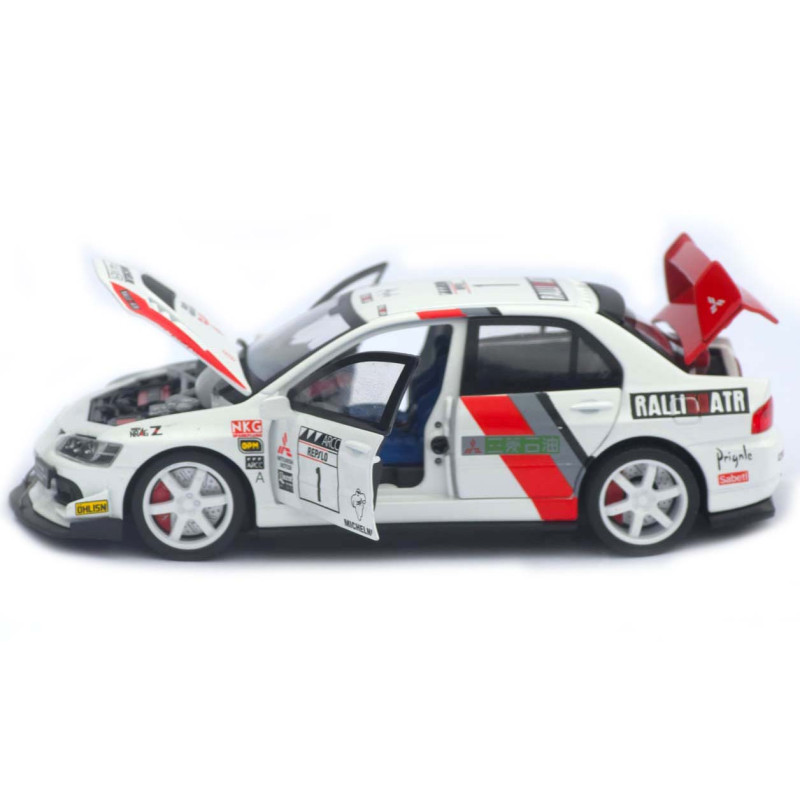 Машинка метал Mitsubishi Lancer Evolution IX біла 1:32 світло звук відч двері капот багаж (TK-13970)