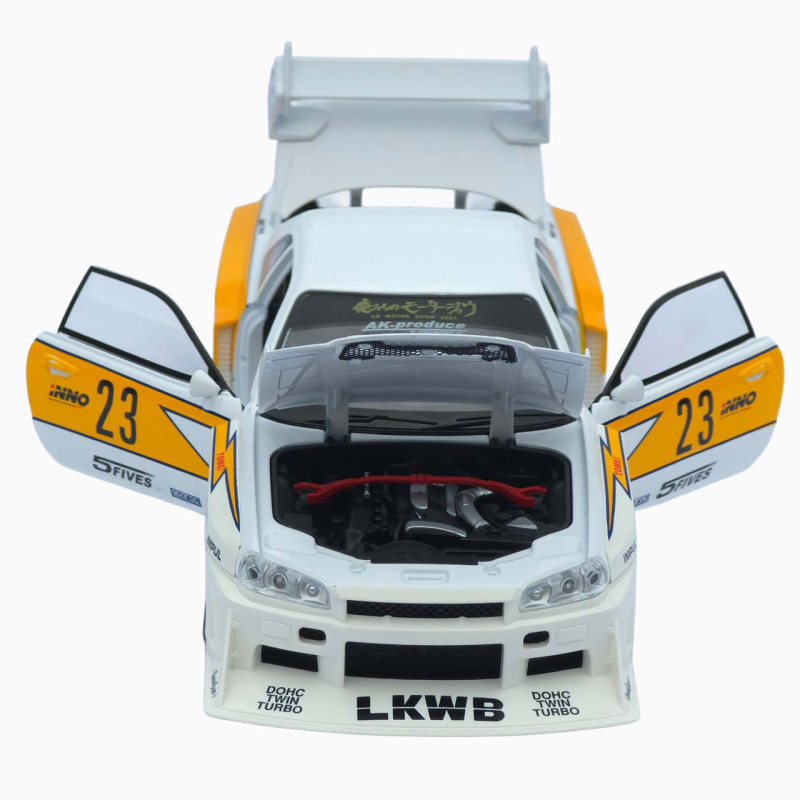 Машинка метал Nissan Skyline GT-R (R34) АвтоЕксперт біла 1:24 звук світло відч двері капот багажник (2916-39)