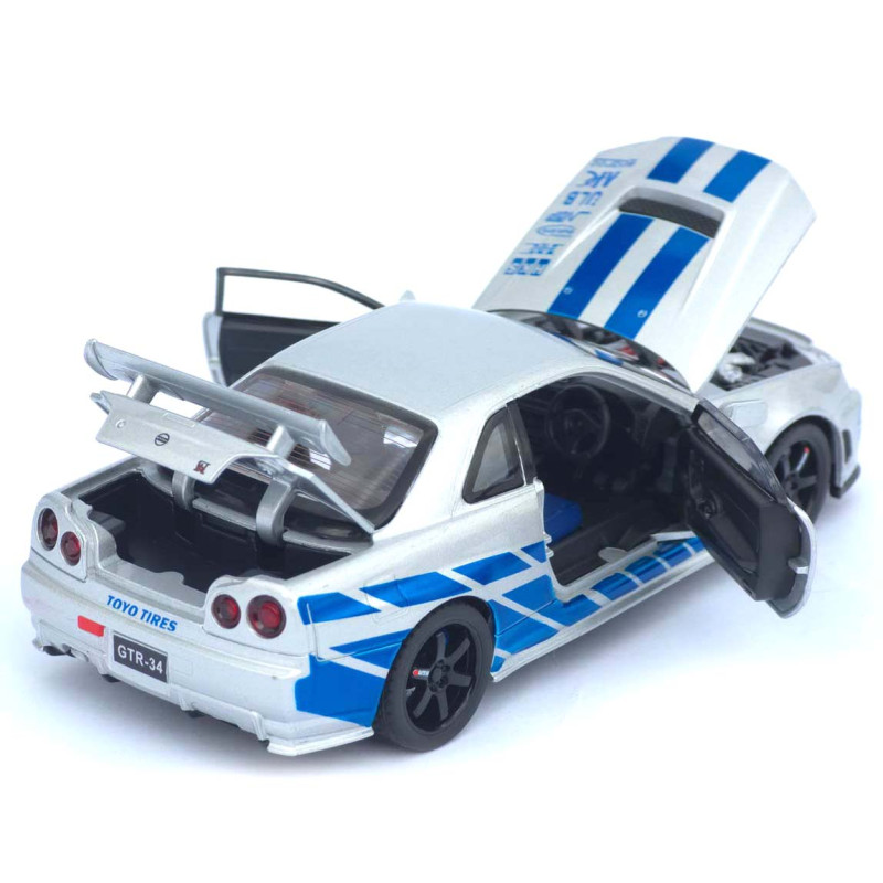 Машинка метал Nissan Skyline GT-R срібляста 1:32 світло звук інерція відч двері капот багаж (TK-13306)