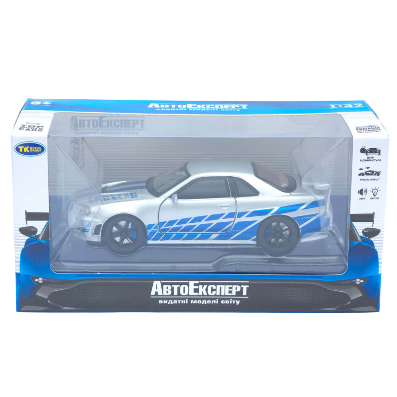 Машинка метал Nissan Skyline GT-R срібляста 1:32 світло звук інерція відч двері капот багаж (TK-13306)