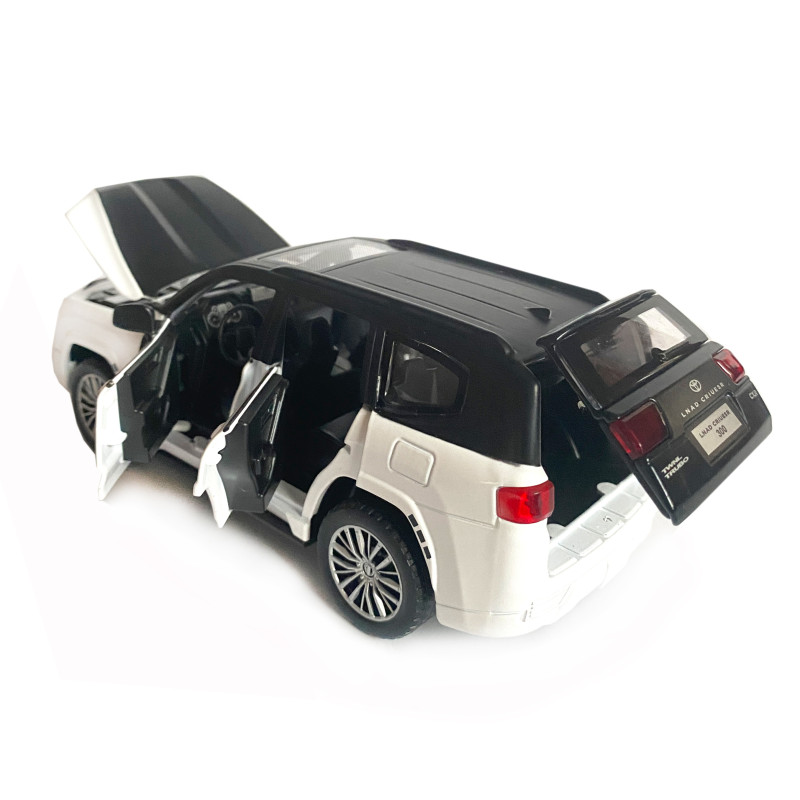Іграшкова машинка металева Toyota Land Cruiser 300 twin turbo, тойота ленд крузер,чорно-білий, звук, світло, інерція, відкр двері, багажник, капот, 1:32, 15*7*6см (ТК-15607)