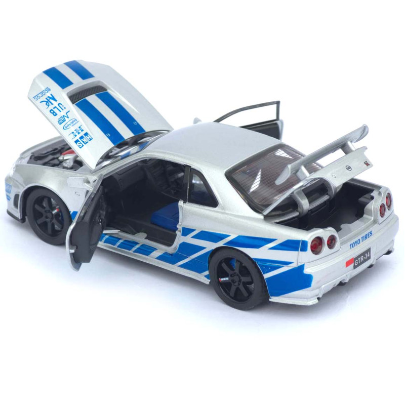 Машинка метал Nissan Skyline GT-R срібляста 1:32 світло звук інерція відч двері капот багаж (TK-13306)