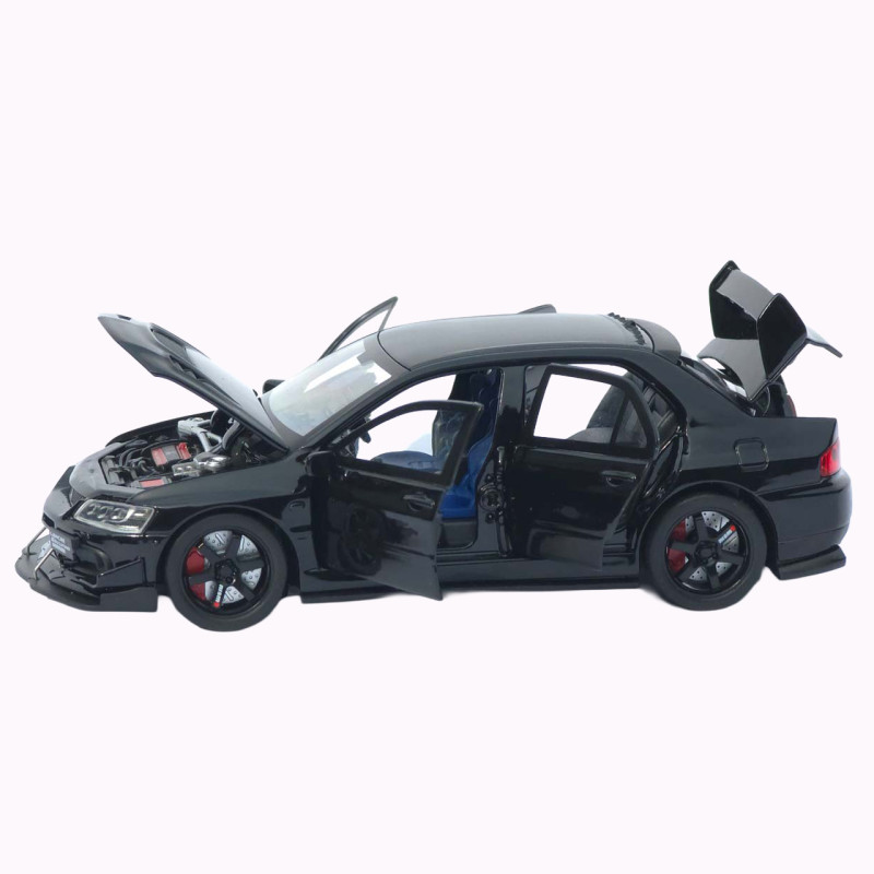Машинка метал Mitsubishi Lancer Evolution IX чорна 1:32 світло звук інерція відч двері баг капот 15*5,5*4,5см (TK-20651)
