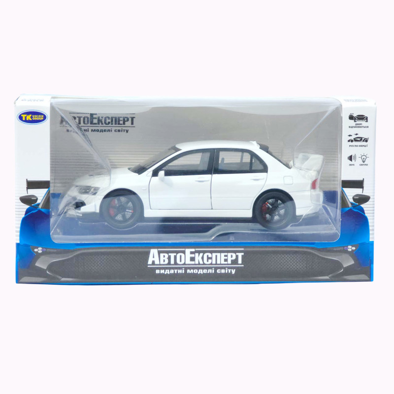 Mitsubishi Машинка метал Lancer Evolution IX біла 1:32 світло звук інерція відч двері баг капот 15*5,5*4,5см (TK-20651)