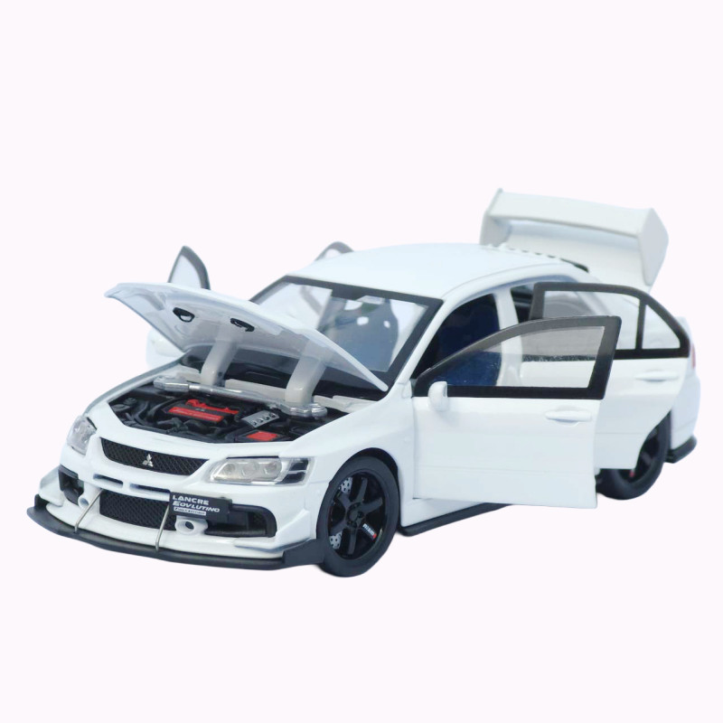 Mitsubishi Машинка метал Lancer Evolution IX біла 1:32 світло звук інерція відч двері баг капот 15*5,5*4,5см (TK-20651)