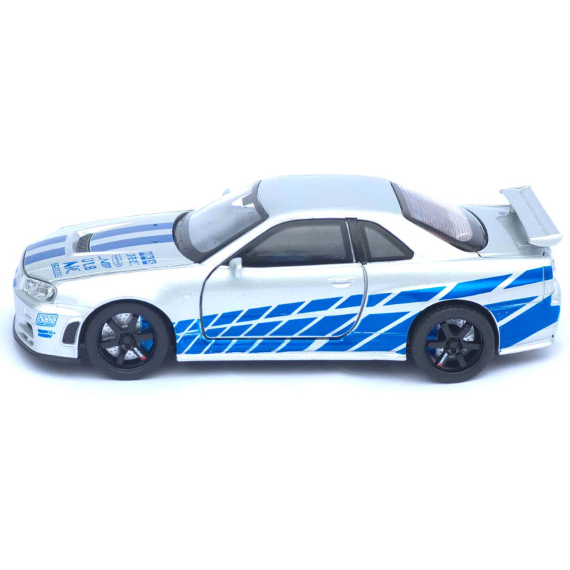 Машинка метал Nissan Skyline GT-R срібляста 1:32 світло звук інерція відч двері капот багаж (TK-13306)